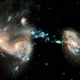Illustration for article titled The Cosmic Wonder of Colliding Galaxies